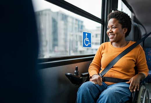 wheelchair woman smiling bus seatbelt_web
